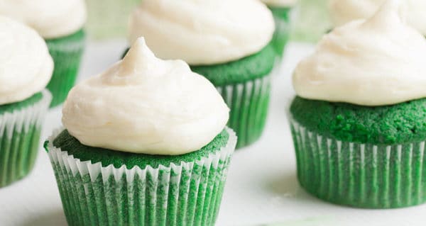Green cupcakes with white frosting, cannabis desserts