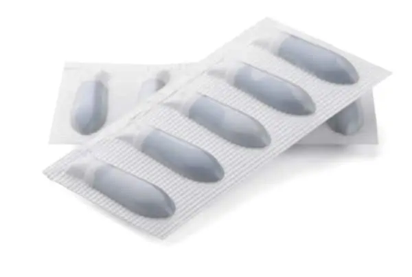 pills packaged isolated on white, rectal cannabis suppositories