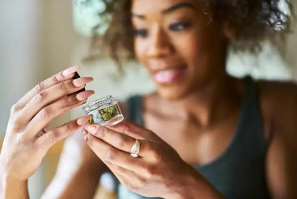 African american women opening container of cannabis, cannabis jobs in Las Vegas