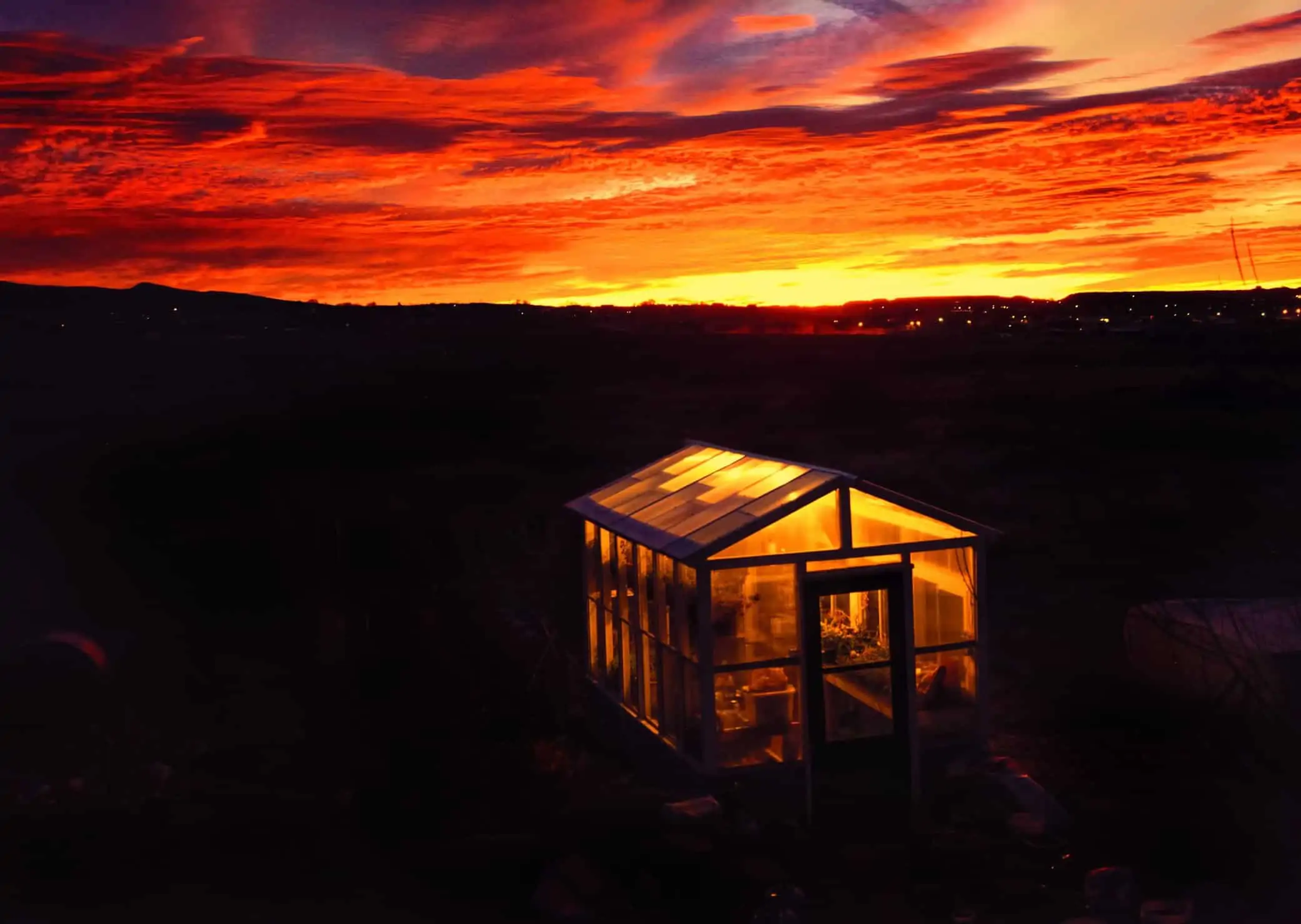 Ideal marijuana lighting for your winter grow. Cabin with colorful sky.