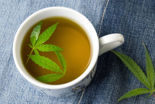 A History of Cannabis Tea. Cup of tea with a pot leave in it.