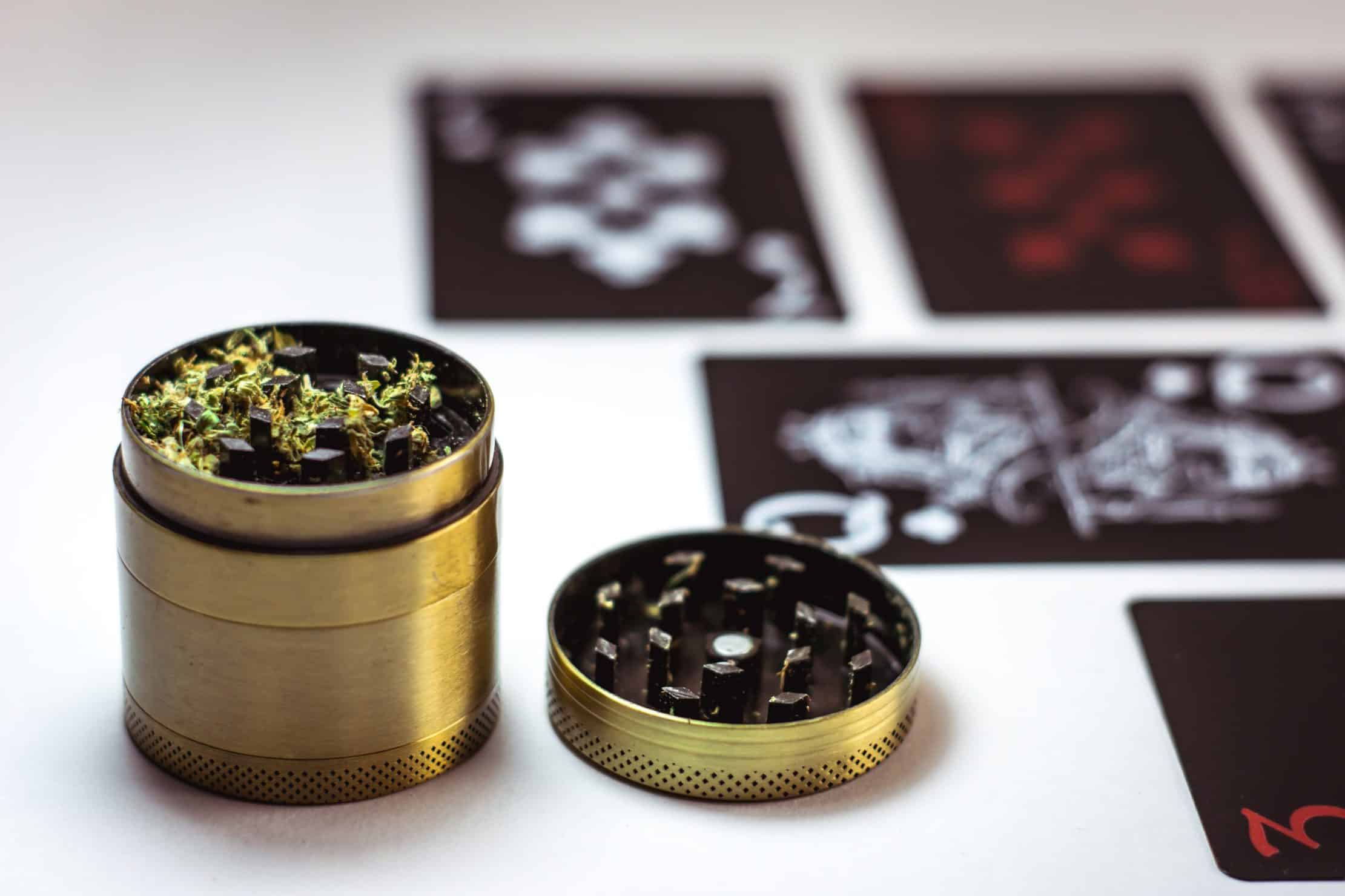 The Best Substitutes For A Marijuana Grinder. Gold grinder with herbs in it.