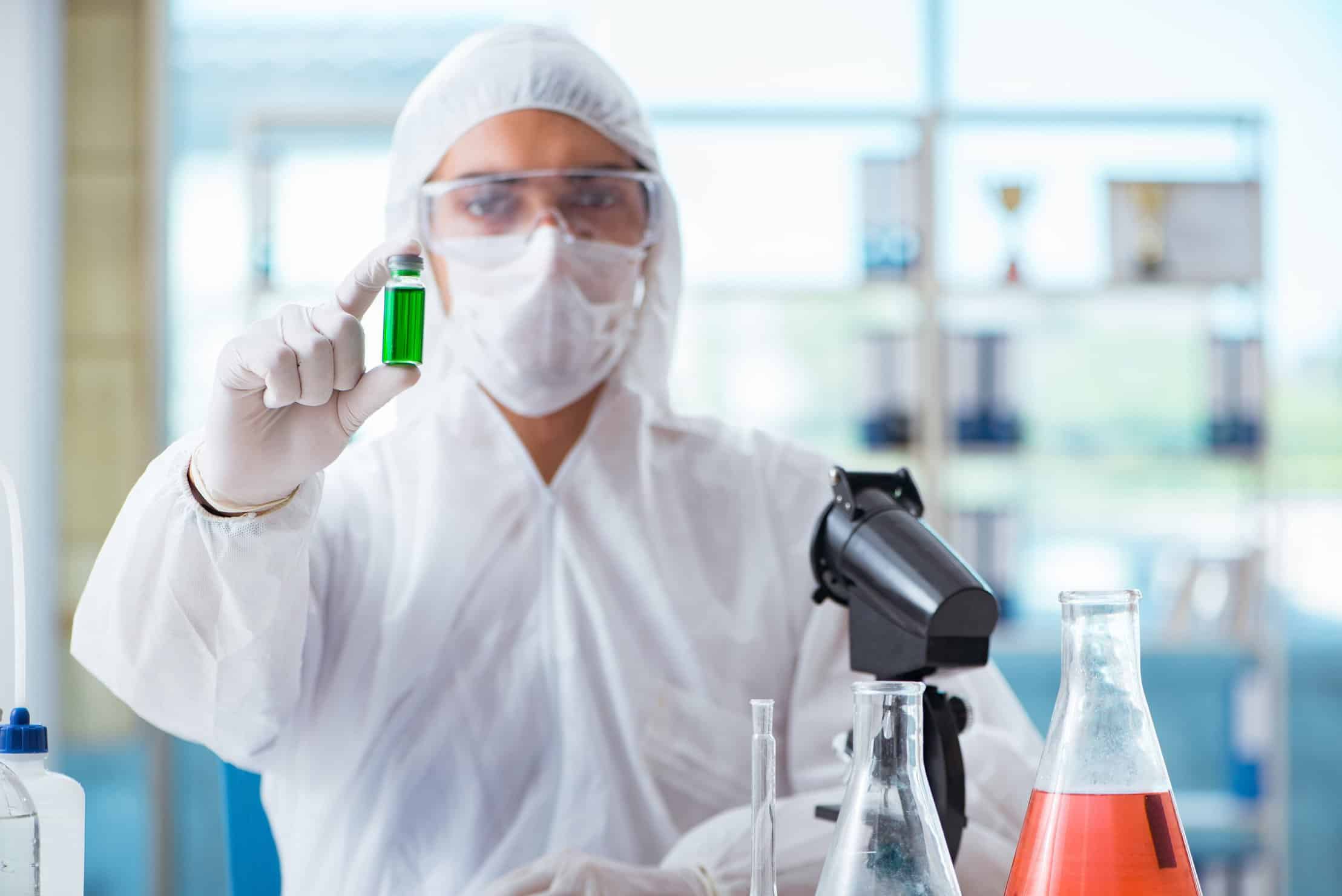 Marijuana Contaminants: Identification, Testing, and Prevention. Person in lab coat.