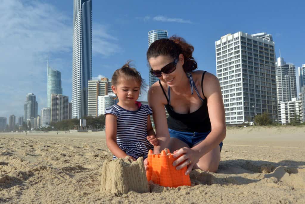 Cannabidiol and KIds: What You Need to Know. Mom and daughter on a beach