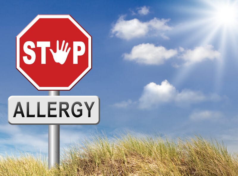 stop sign and allergy sun with sun shinning in background, cannabis allergy symptoms