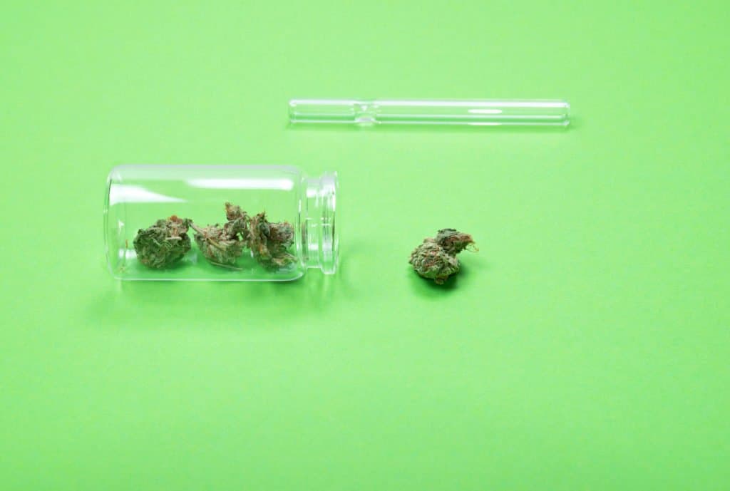 Chillums and one-hitters. Cannabis in a glass jar