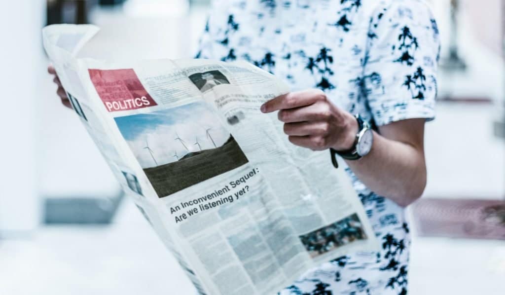 States Ban Flavored Vaping Products and Nevada Gets Its First Cannabis Lounge 1 Person reading a newspaper about Vaping bans and Nevada's cannabis lounge
