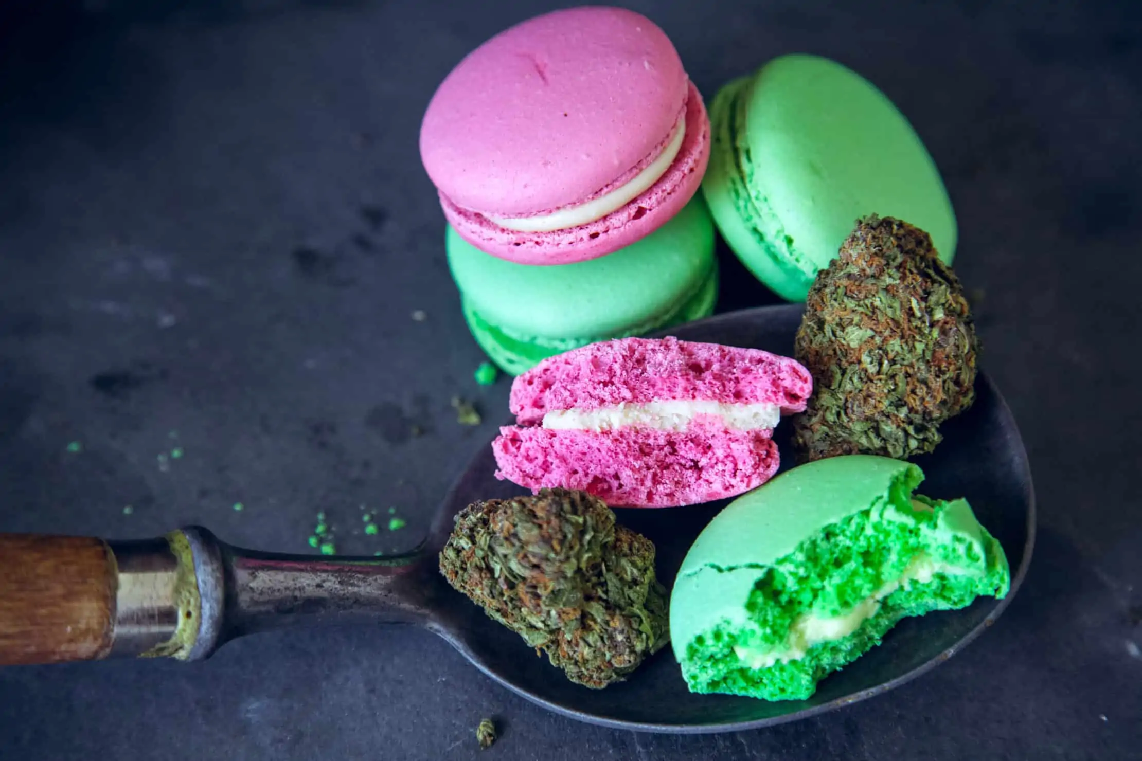 What Are The Side Effects of Edibles? Weed and edibles on a spoon.