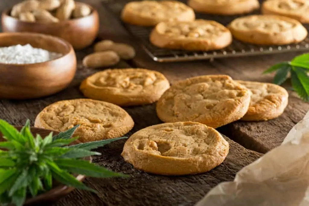 cookies on table with cannabis leaf, no bake edibles with cannabutter
