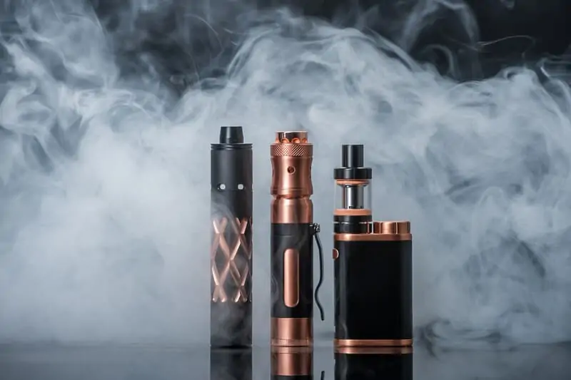 black and gold vapes against smoke, cannabis insurance