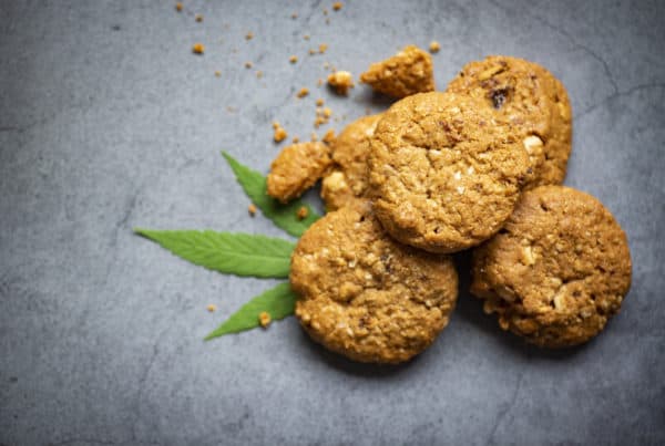 cookies in a pile with a marijuana leaf, marijuana cookie recipe