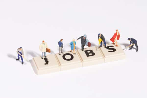 jobs spelled out in blocks with people on them, the great resignation