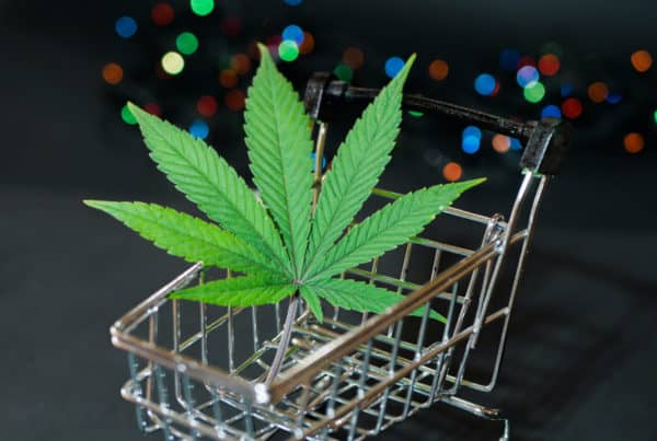 Cannabis leaf in shopping cart, cannabis deals