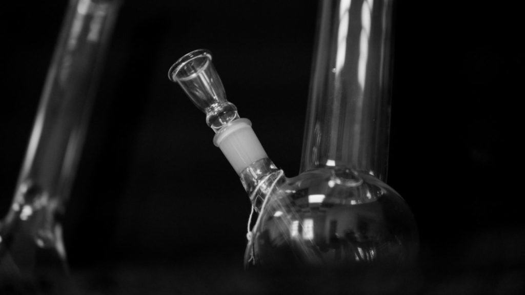 glass bong on black, marijuana paraphernalia