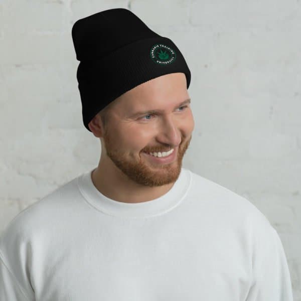 man in a cannabis training university beanie weed hat. 420 clothing.