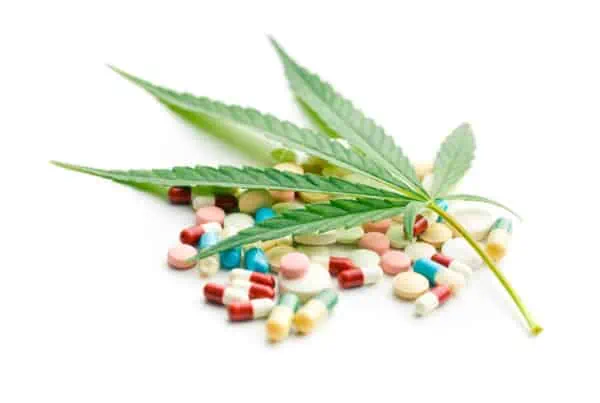 marijuana and antibiotics isolated on white