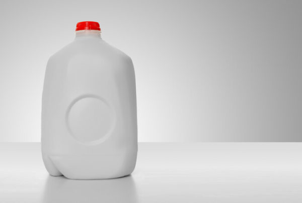 gallon of milk on white surface, how many liters are in a gallon