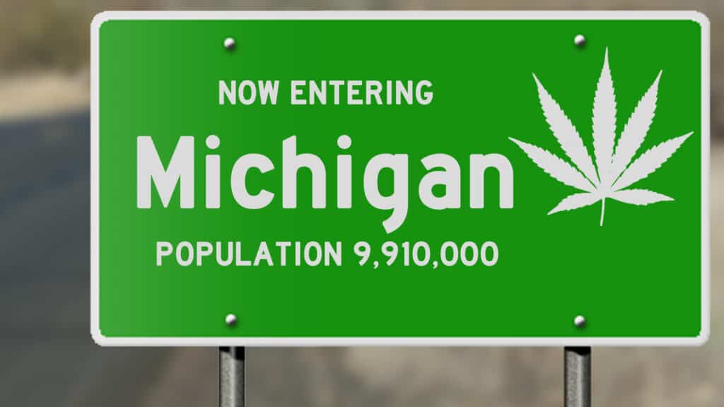How to start a marijuana business in Michigan. Michigan highway sign with a pot leaf on it