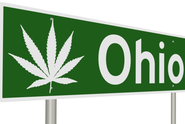 A rendering of a green road sign with marijuana leaf for Ohio