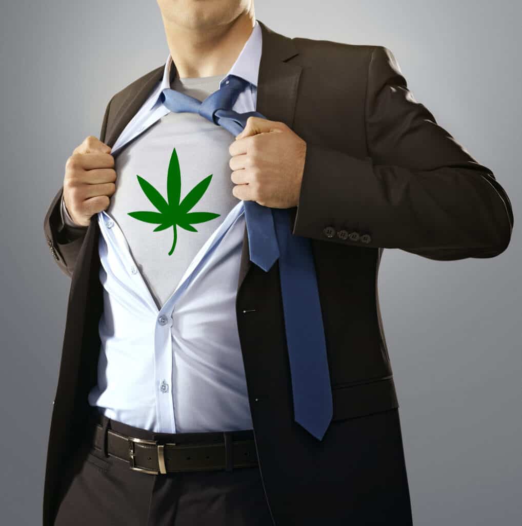 Cannabis jobs. Man in a cannabis t shirt like a superhero 