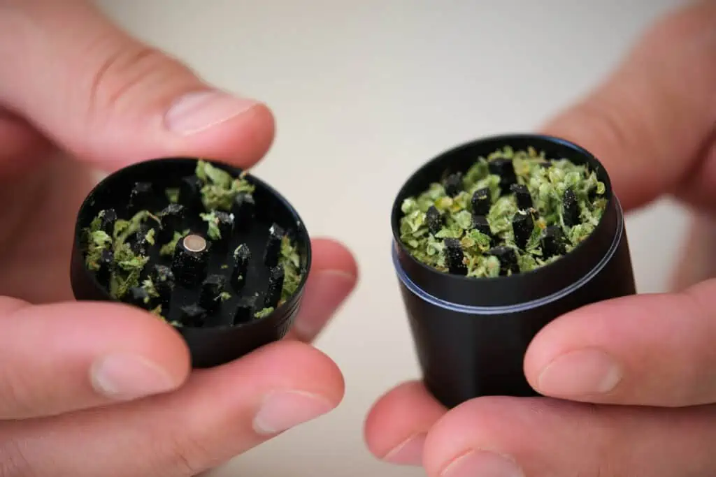 weed in a grinder for packing a bowl of weed