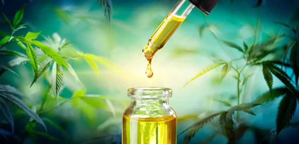How to make THC tincture. A THC tincture dripping from an eyedropper 