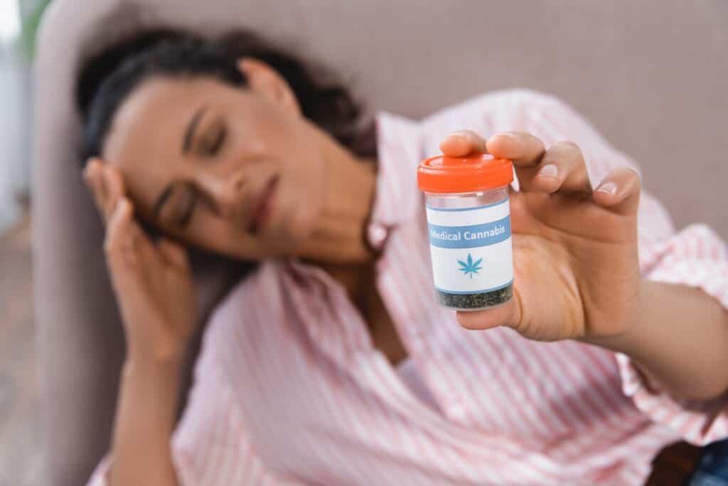 woman using cannabis for pain and migraines 
